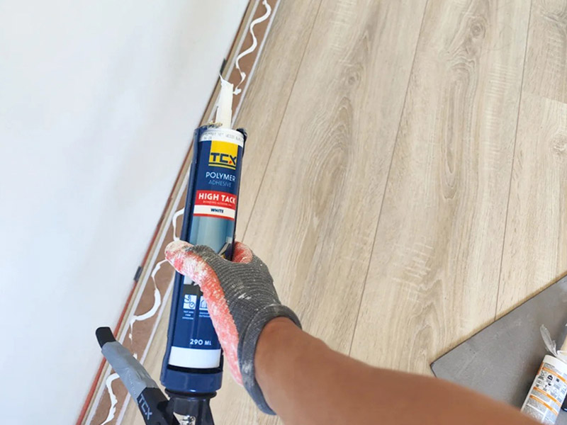 Baseboards installed with nails