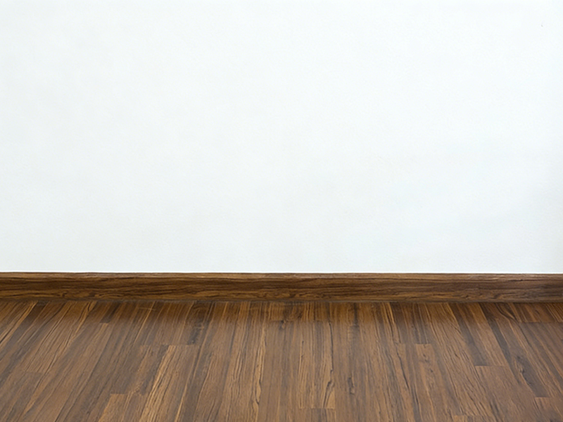Baseboards are the same color as the floor