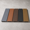 Close-up of co-extruded WPC decking board showing ASA surface layer and realistic wood grain texture.